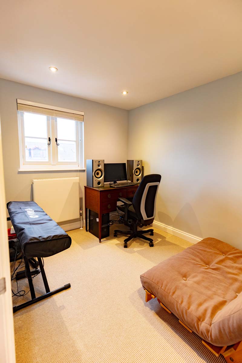 Soundproofed music room with studio monitors in a dormer loft conversion in Bishopston, Bristol