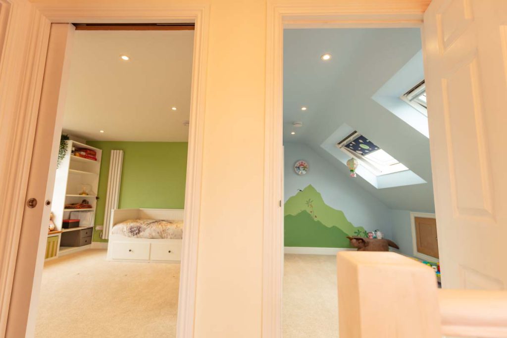 View from the landing into the two new loft bedrooms in a Brislington hip-to-gable conversion