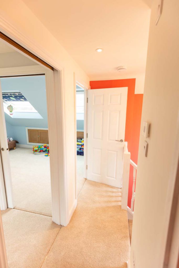 New loft landing with doors opening to the two bedrooms in a Brislington hip-to-gable conversion
