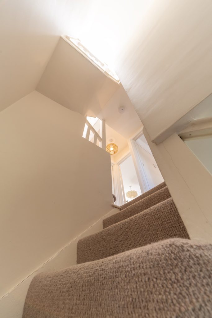 Bespoke quirky staircase built for the low-ceiling loft in a Horfield dormer conversion, Bristol