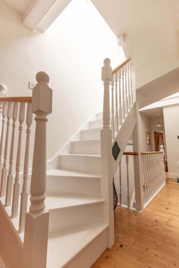 Bespoke timber staircase in a Bristol loft conversion by J Vincent